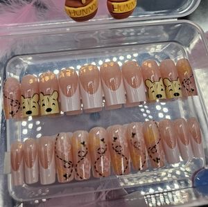 24 piece pooh press on nail set with matching earrings